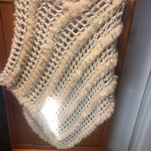 Beautiful crochet rabbit fur embellished triangle poncho.